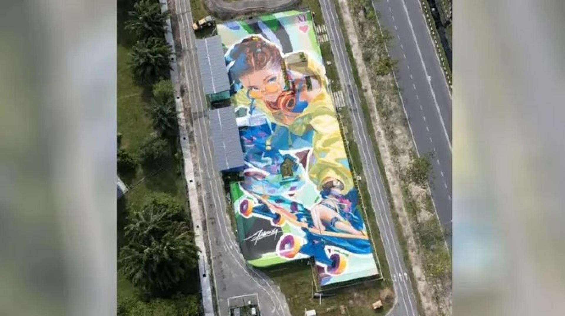 An aerial view of the ‘Random Female Skate Boarder’ at the Skate Park Roundabout in Taman Bulatan Miri.