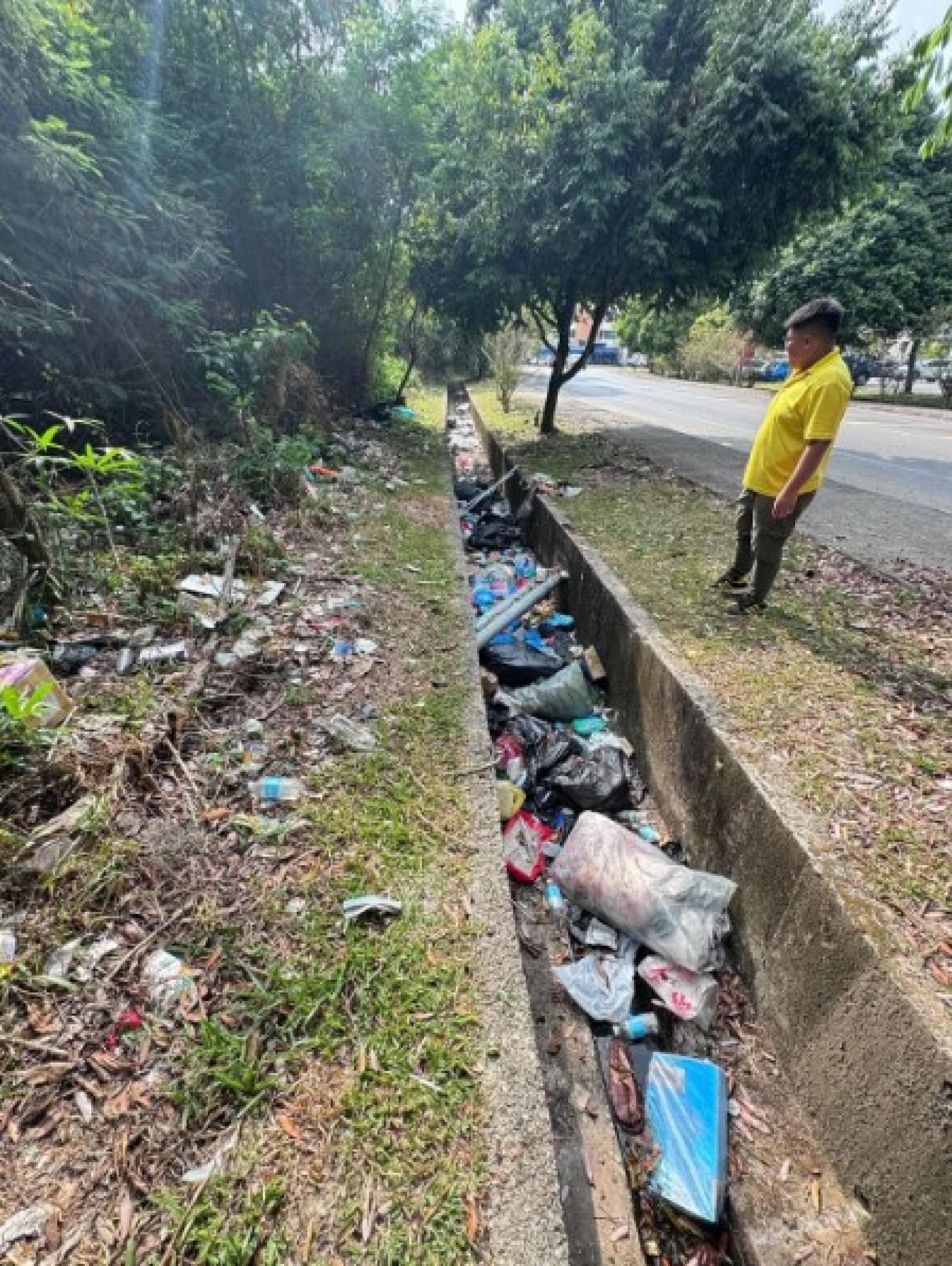The drains clogged with garbage in the Parkcity Commercial Centre area.