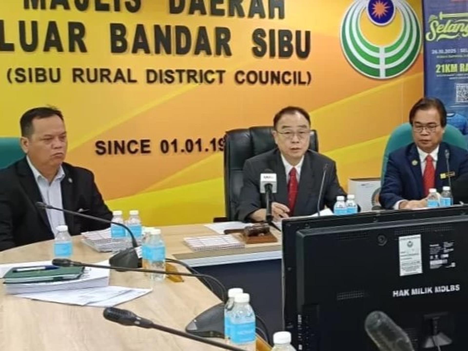 Wong (second from left) speaks to the media.