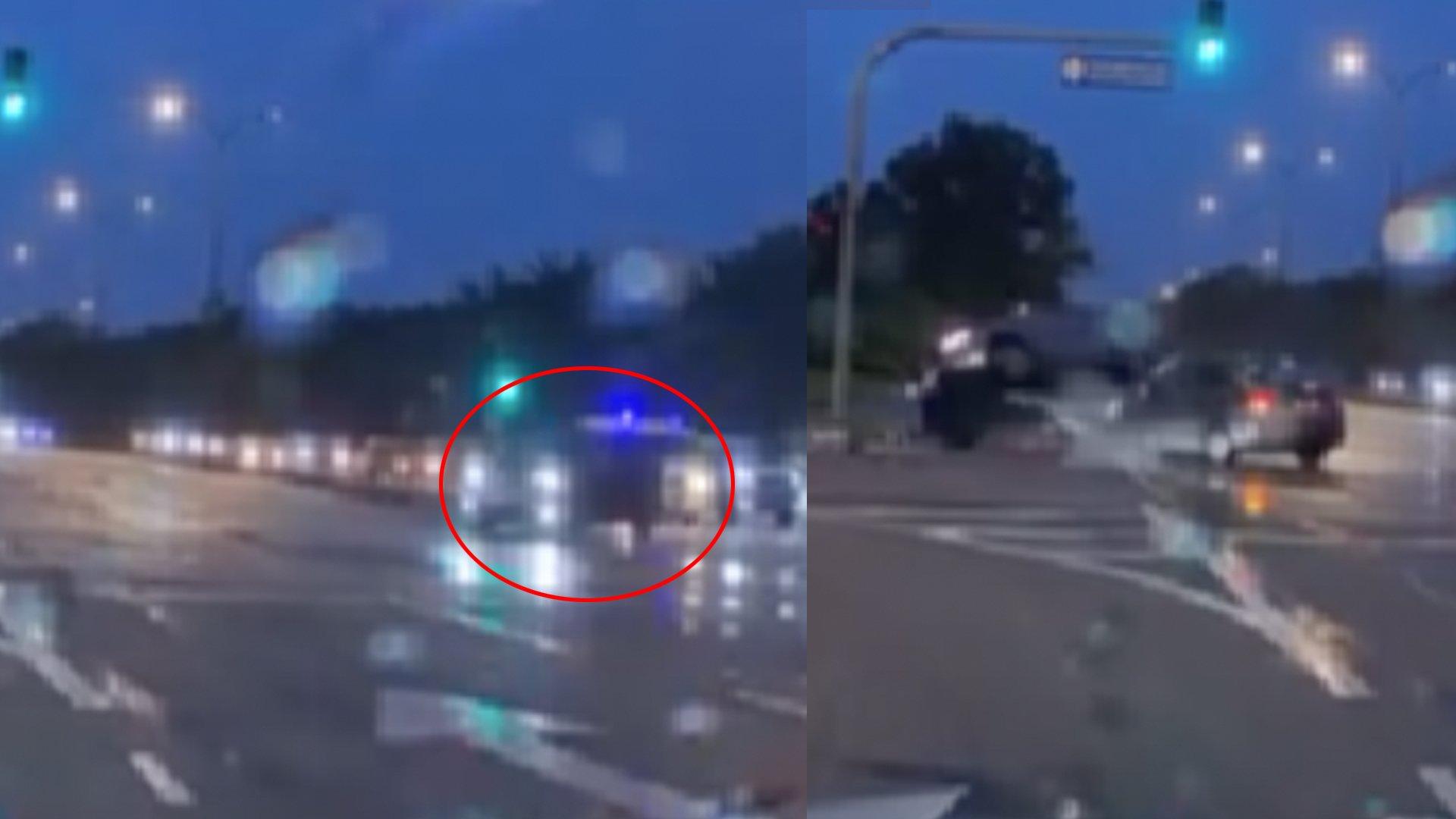 休旅车为了让路给监狱囚犯车，结果闯红灯右转，被直行的一辆车撞至翻覆。