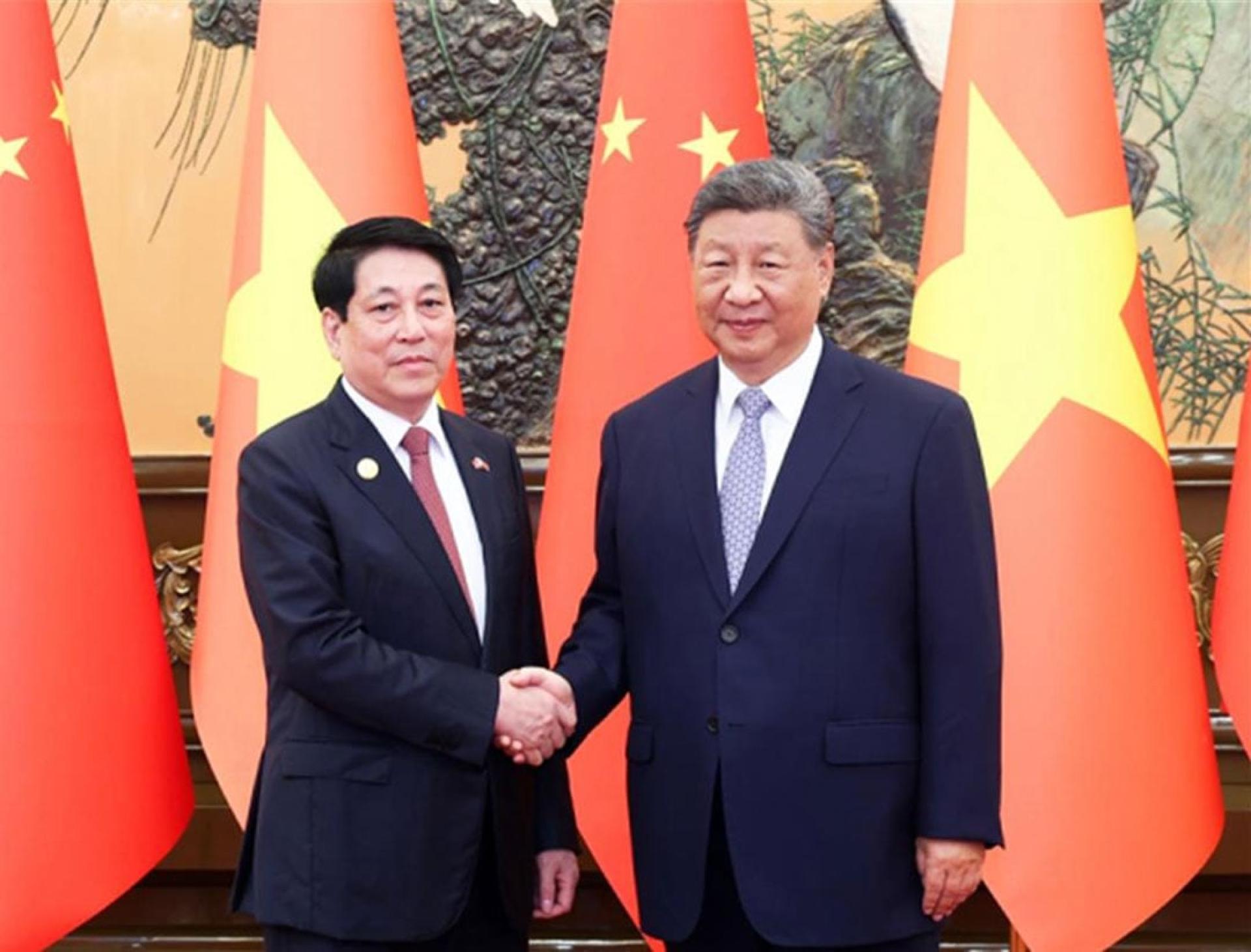 中越两国高层互动升温，展现双边关系持续深化。图为9月4日习近平（右）在北京会见来越南国家主席梁强（左）。
