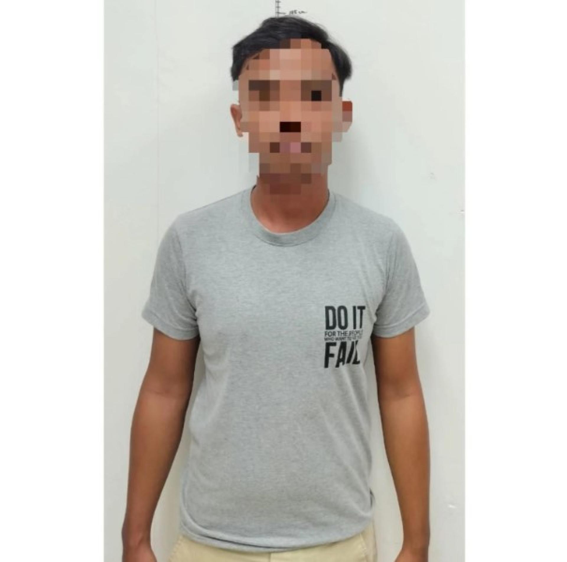 被警方扣留的嫌犯。