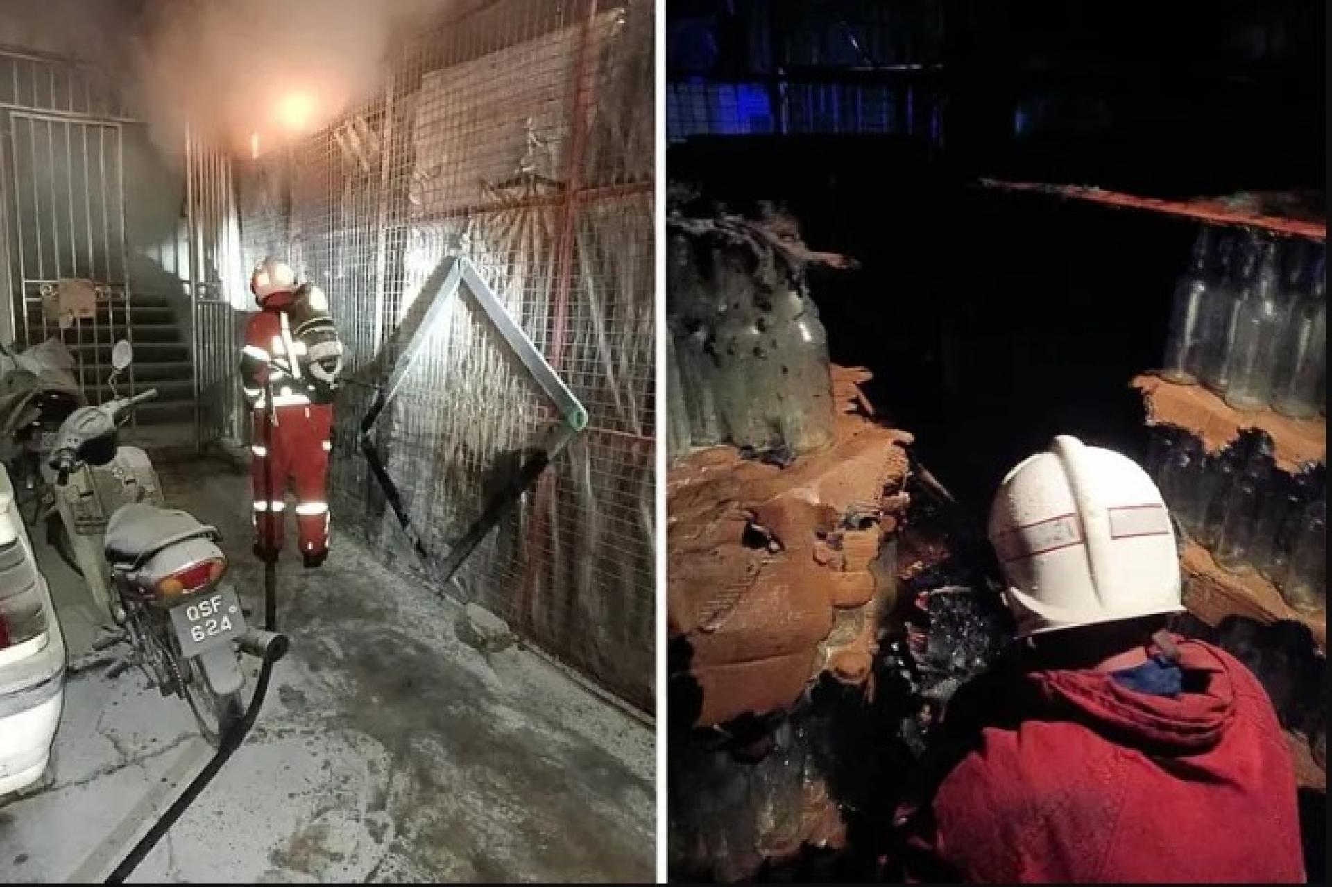 消防员正在扑灭于2025年11月16日发生在诗巫南兰路酒类灌装厂外的火灾。