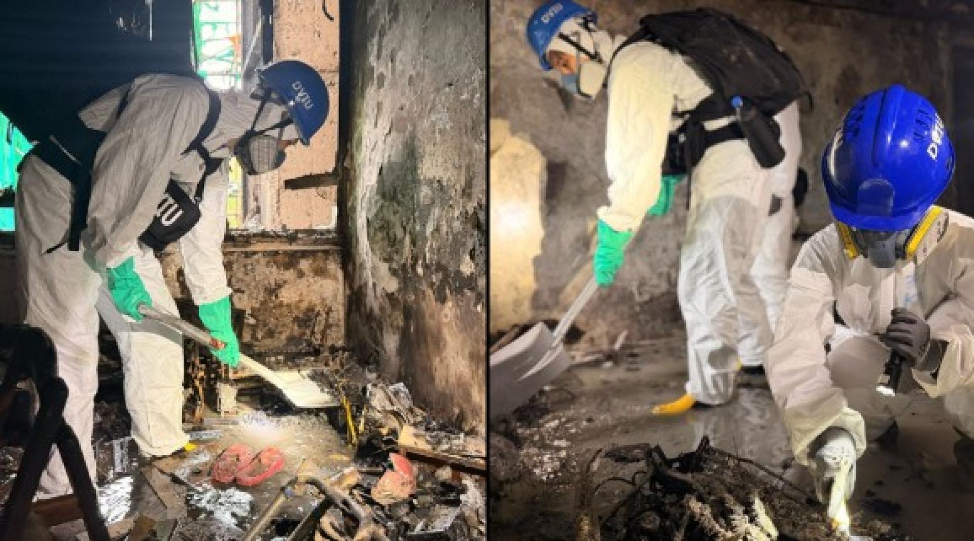 警方发布的照片显示，灾难遇害者辨认组人员30日在灾场搜证。