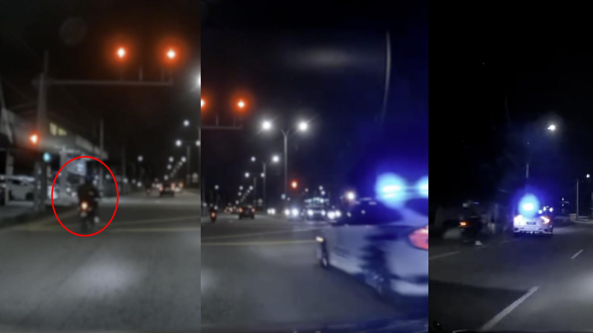 摩托车骑士闯红灯，没想到后边却有一辆警车，结果被拦截接罚单。