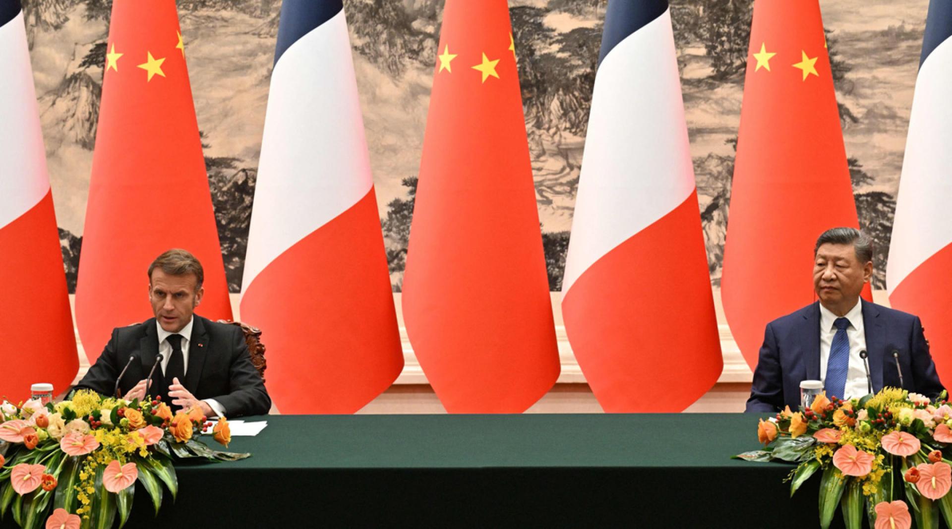 习近平（右）4日与马克宏（左）会谈后共同出席记者会时，作出援助巴勒斯坦的宣布。