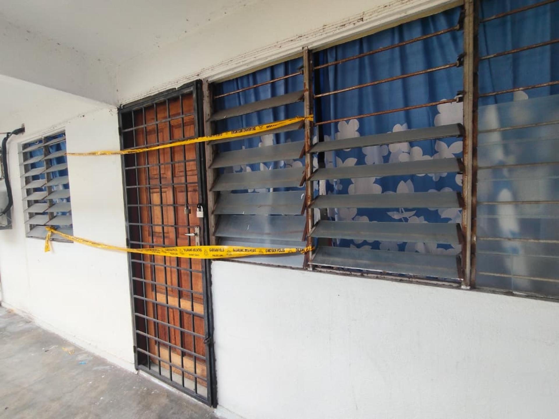 案发单位已被警方拉起黄色警戒线。