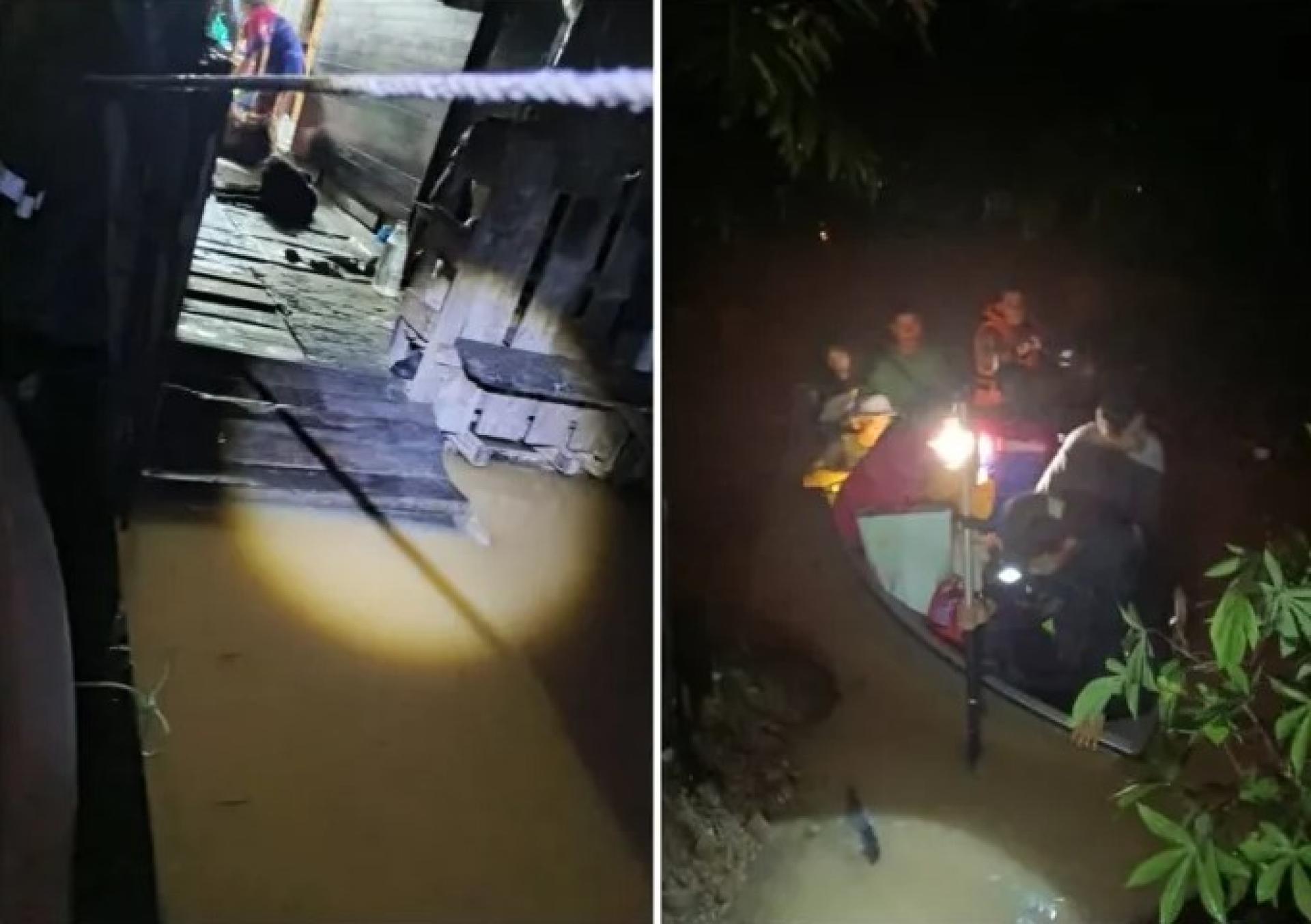 2025年12月23日，基都隆Seberkas棚屋居民乘救生船安全撤离现场。