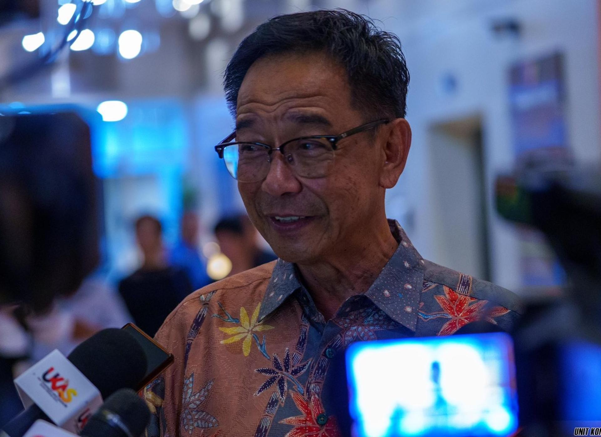 Abdul Karim speaks to reporters during the rehearsal for the 2026 New Year’s Eve celebration.