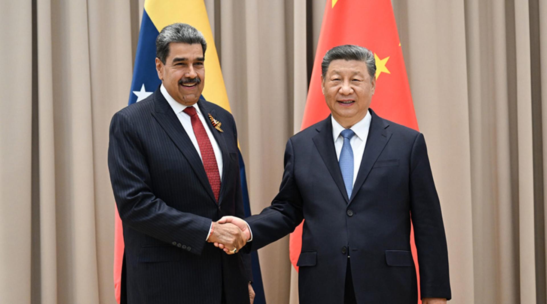 2025年5月9日，习近平在莫斯科会见马杜罗。（图：新华社）