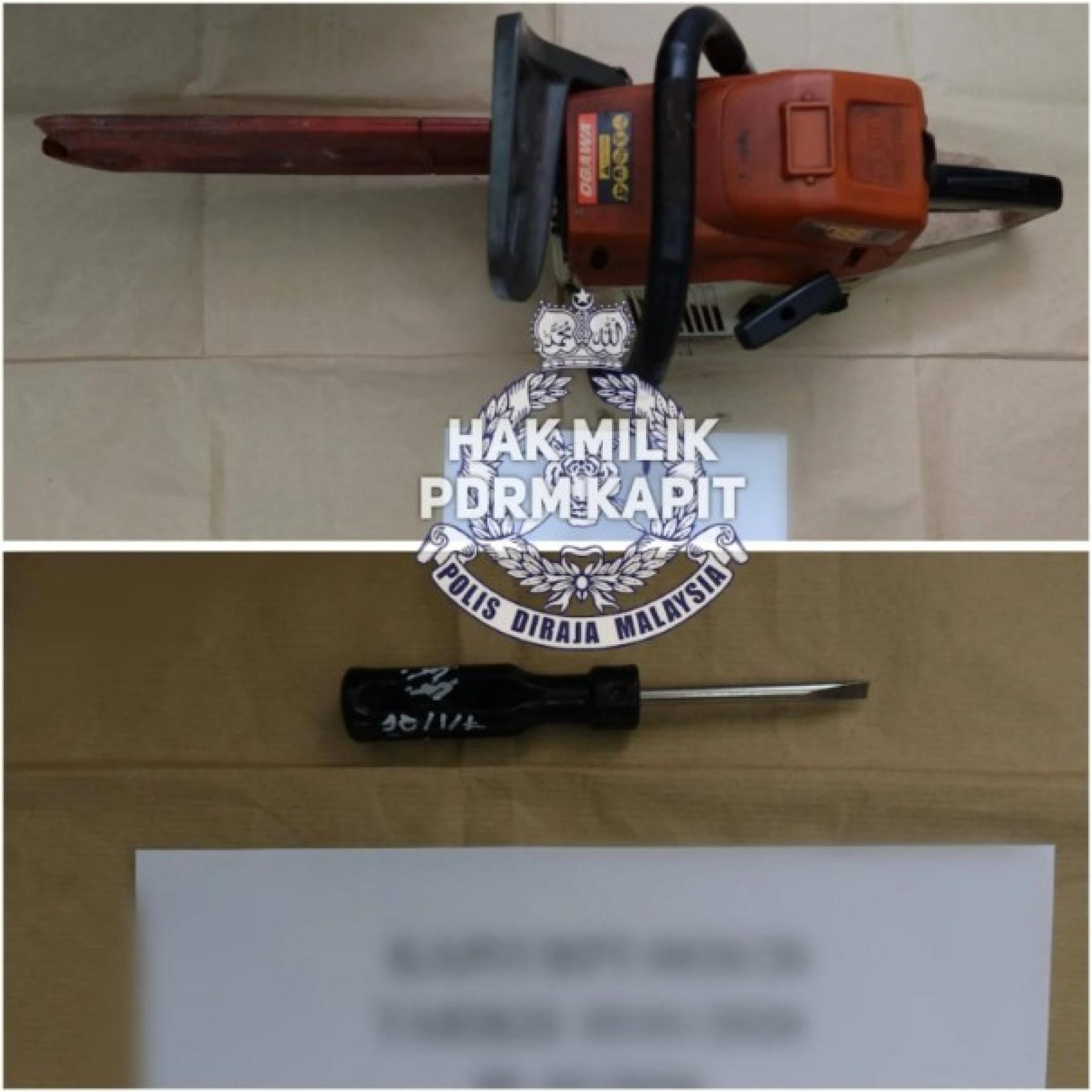 疑为作案工具的电链锯及螺丝刀。