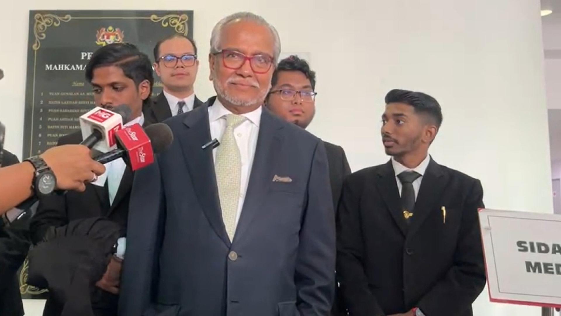 沙菲宜在庭外的记者会上表示，这项和解结果是纳吉的“一场胜利”。