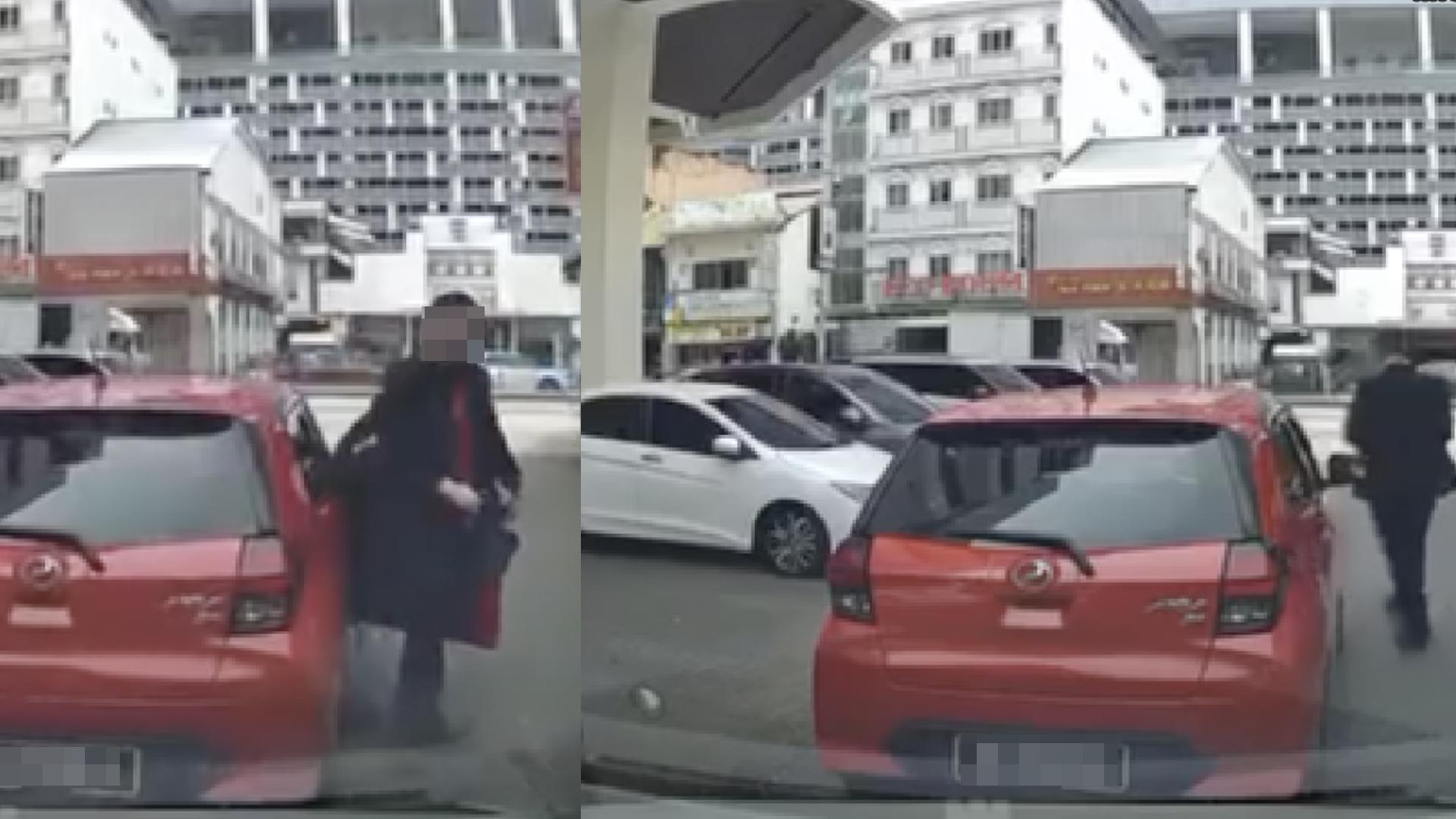 轿车在路中停下，司机不理后方车辆鸣笛就离开车走向建筑物。