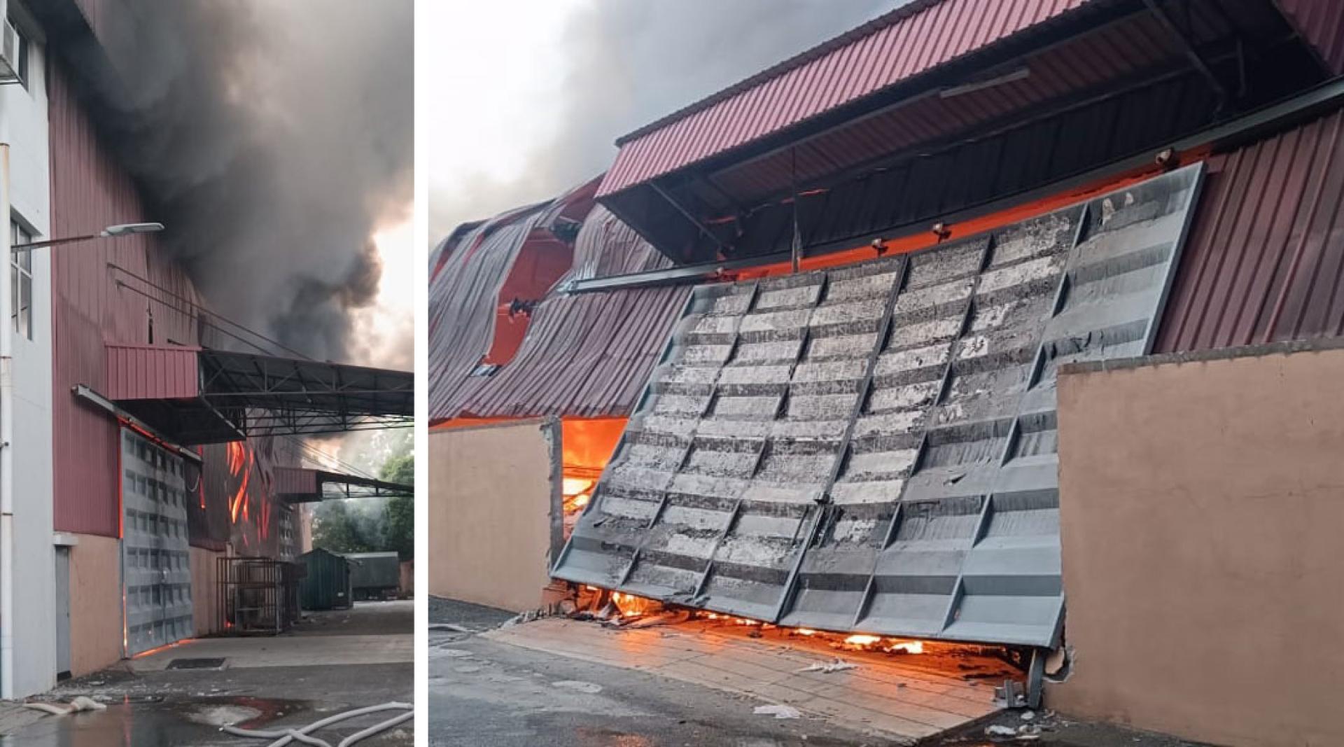 工厂起火浓烟滚滚往外窜。