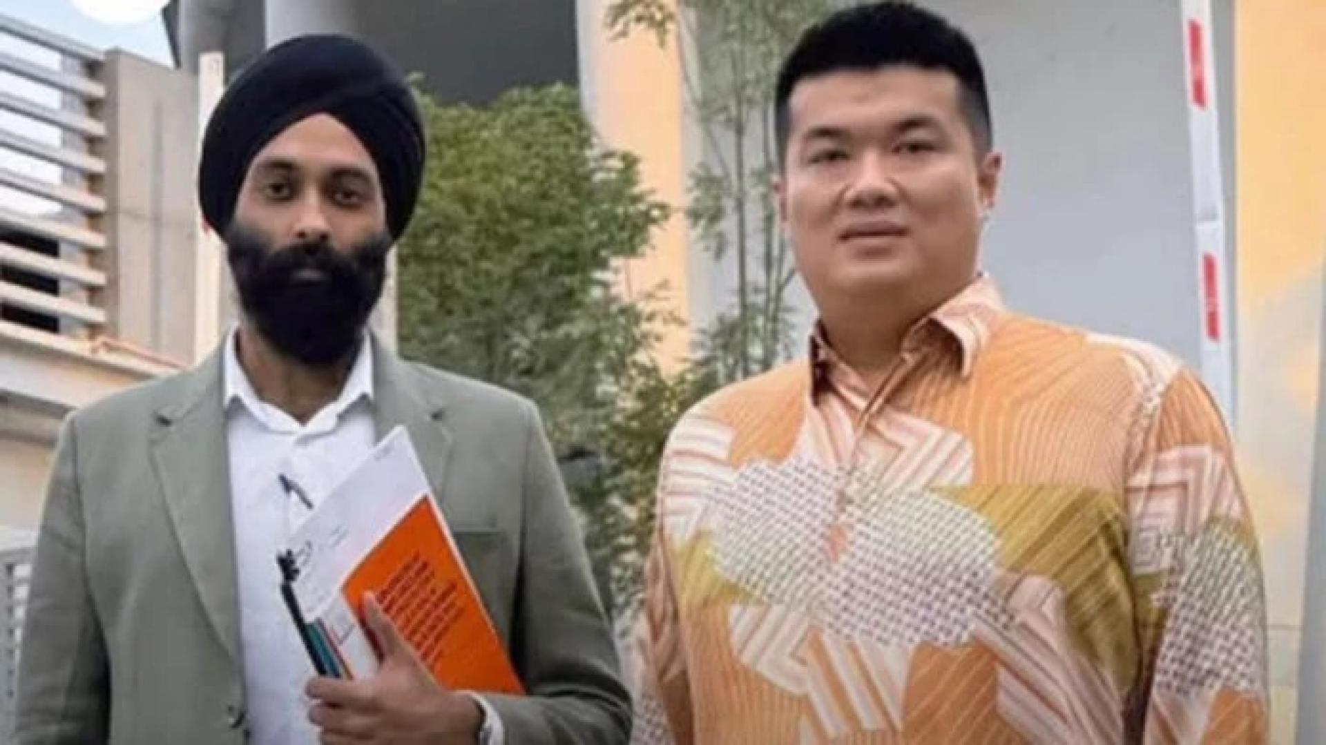 马哈佐星（左），右为刁健城。