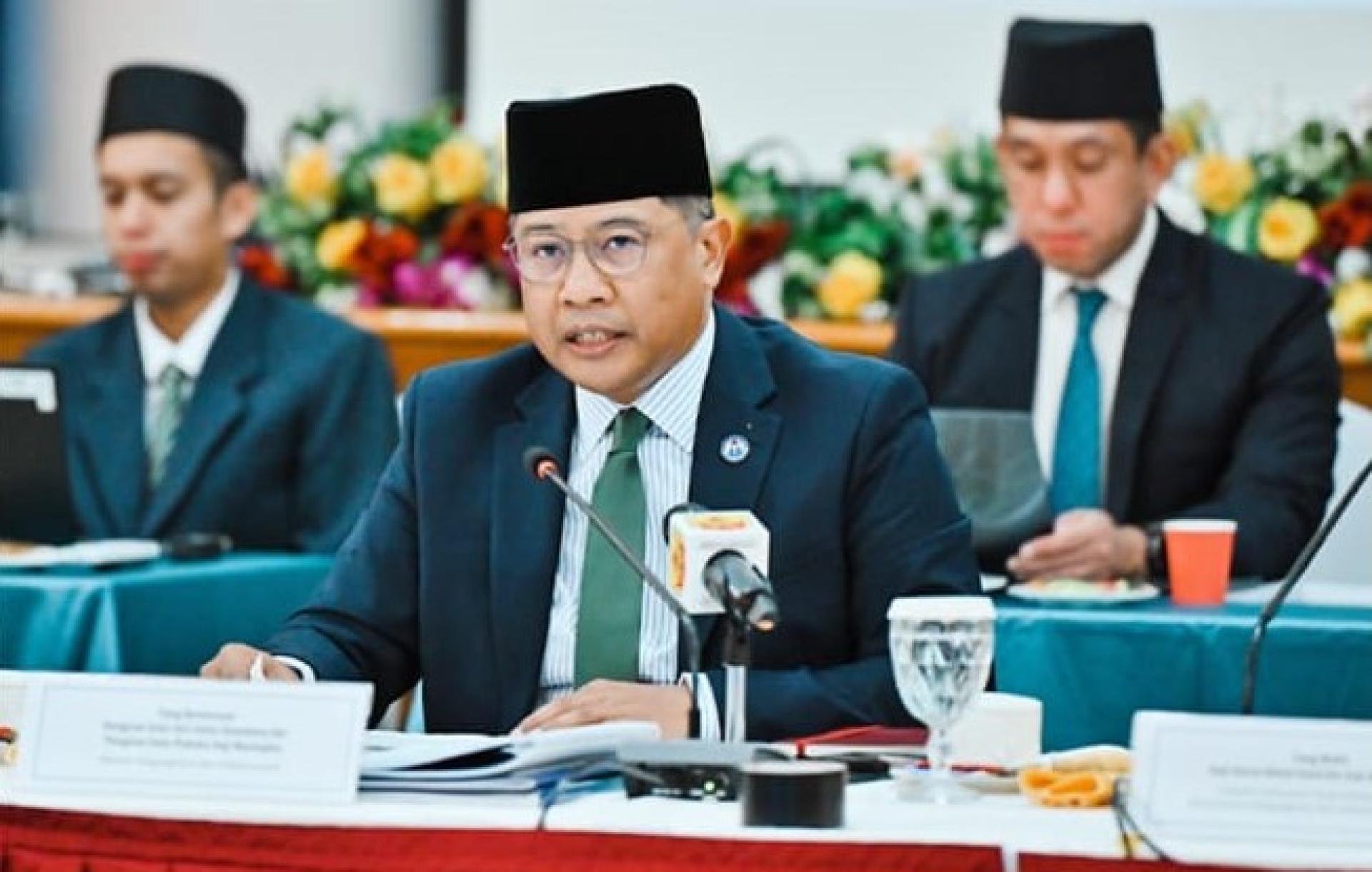 交通与通信部长彭基兰拿督山哈里在交流会上致词