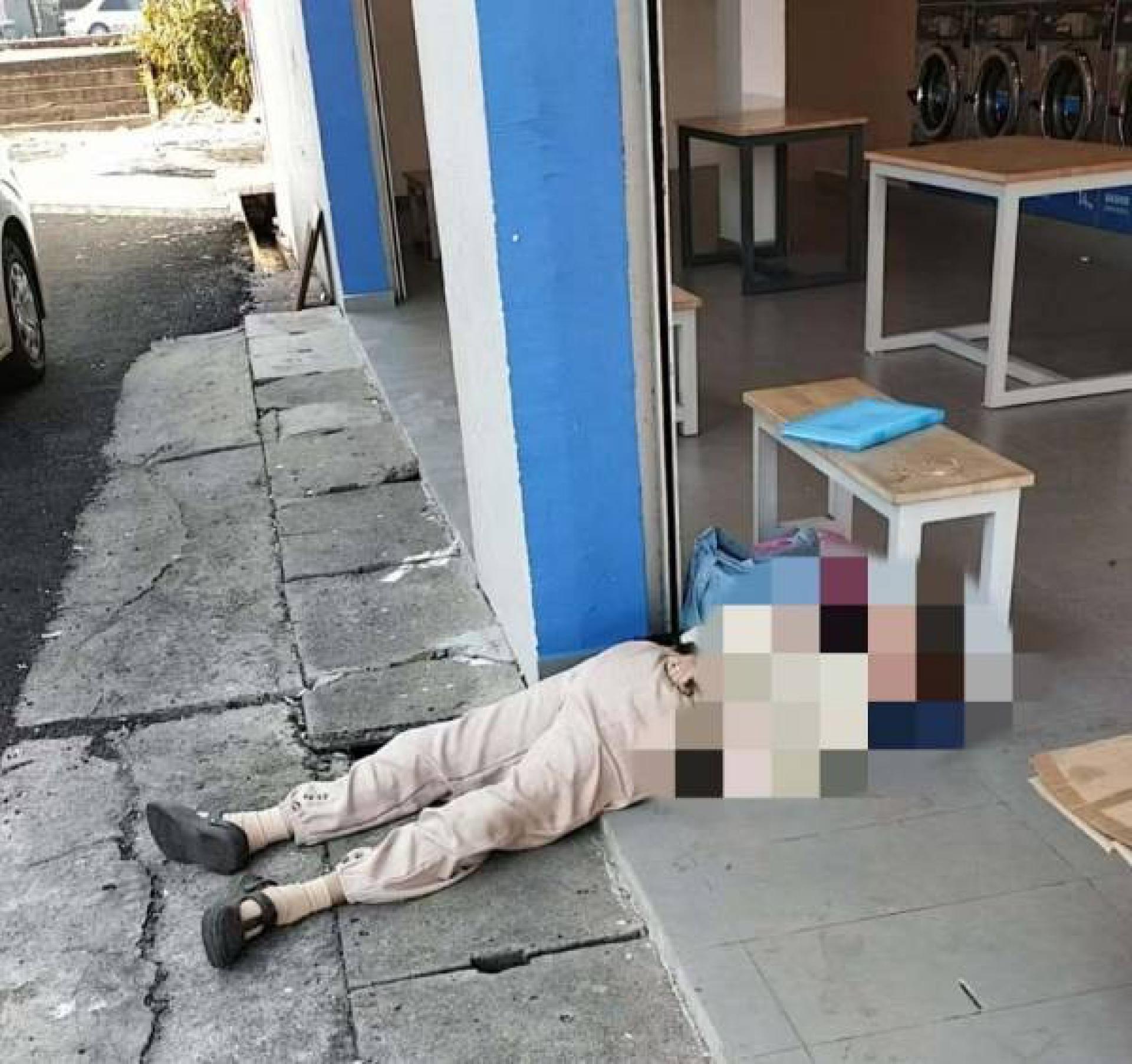 郑丝娟被发现猝死倒卧在自助洗衣店。