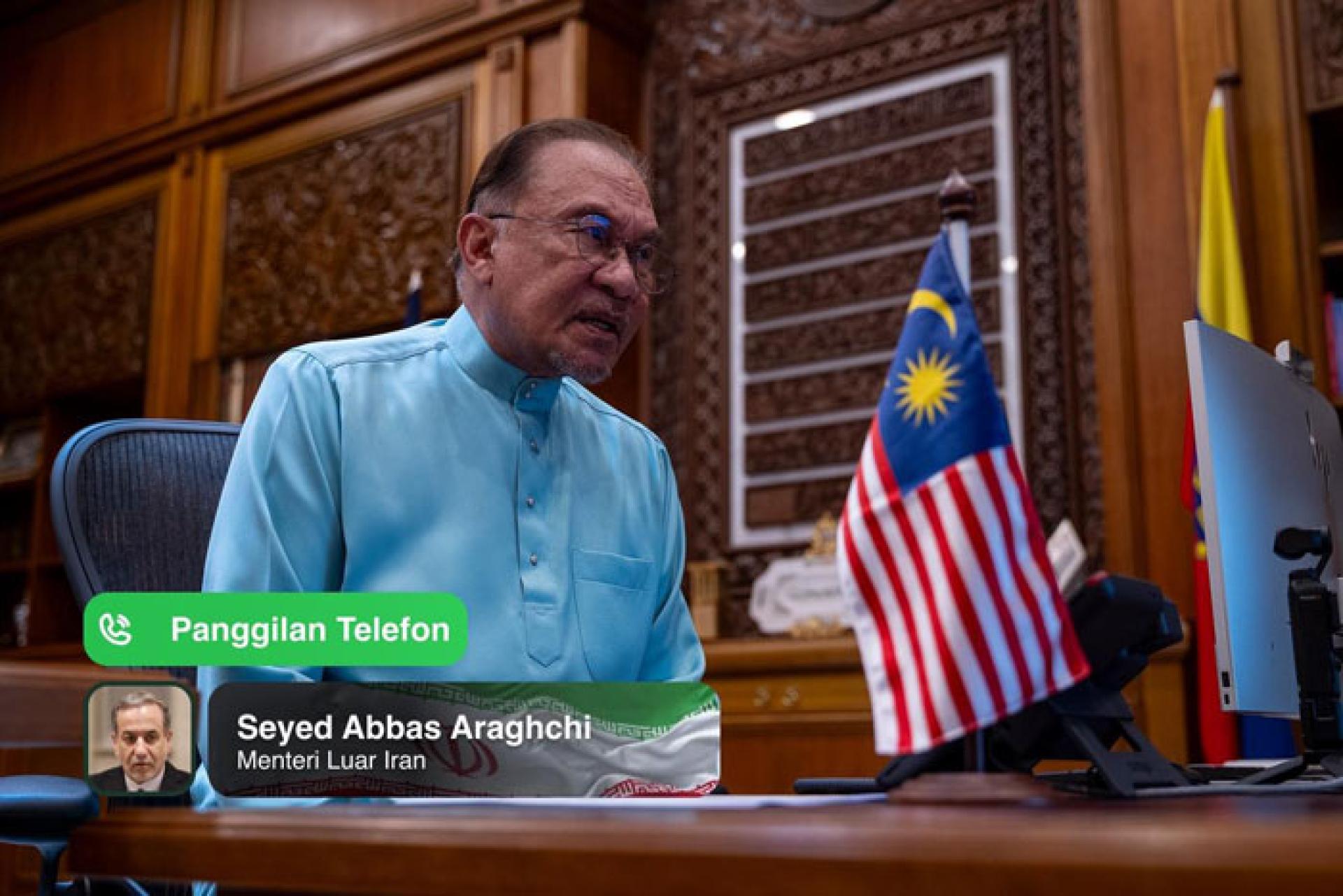 安华与阿拉格齐（小图）通电话，表达马来西亚对伊朗人民在当前艰难时刻的同情与声援。