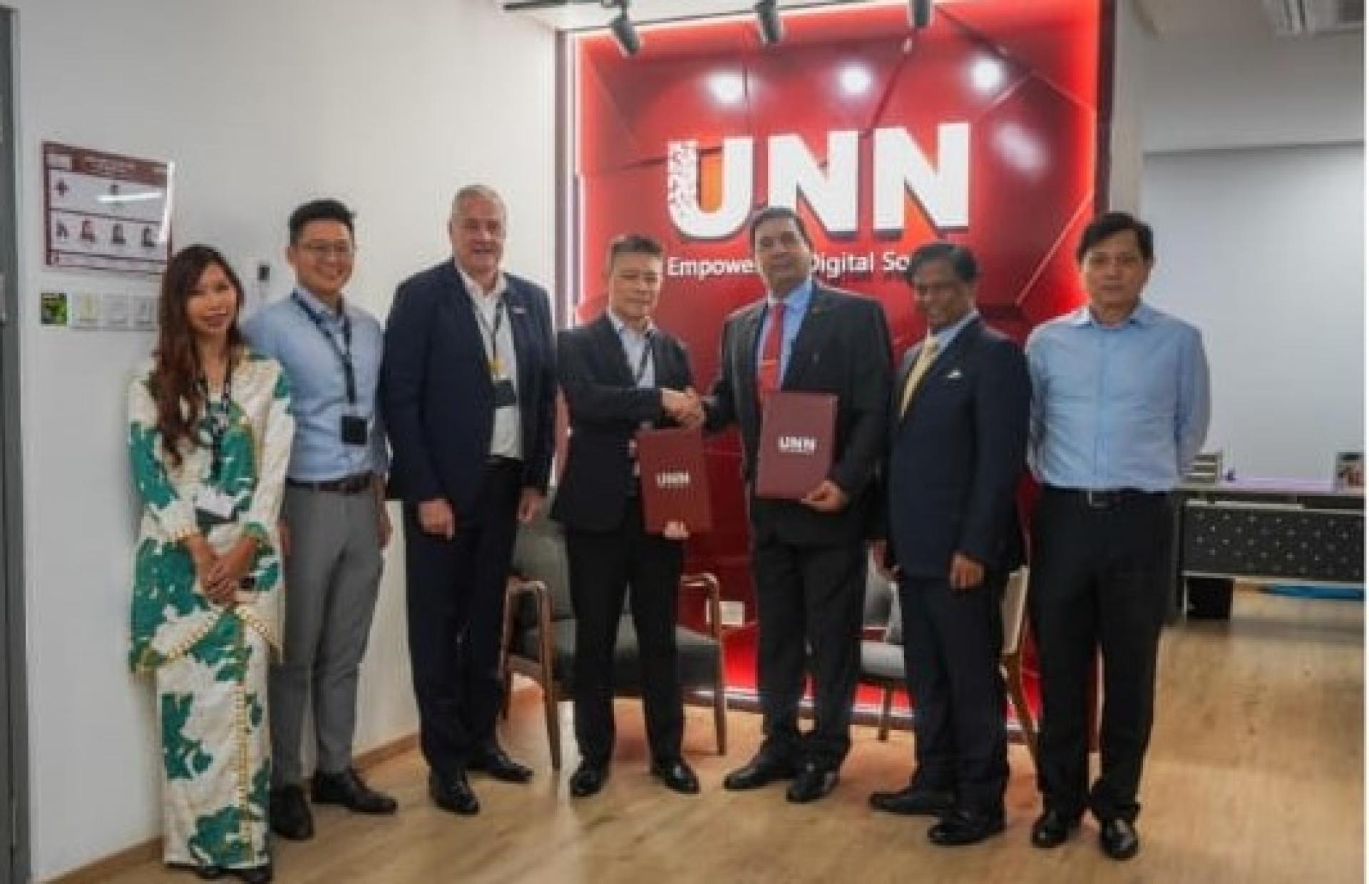 UNN 代首席执行官 Christopher Phan与Watercloud International首席执行官 Leonard Melvin Fernando交换谅解忘录