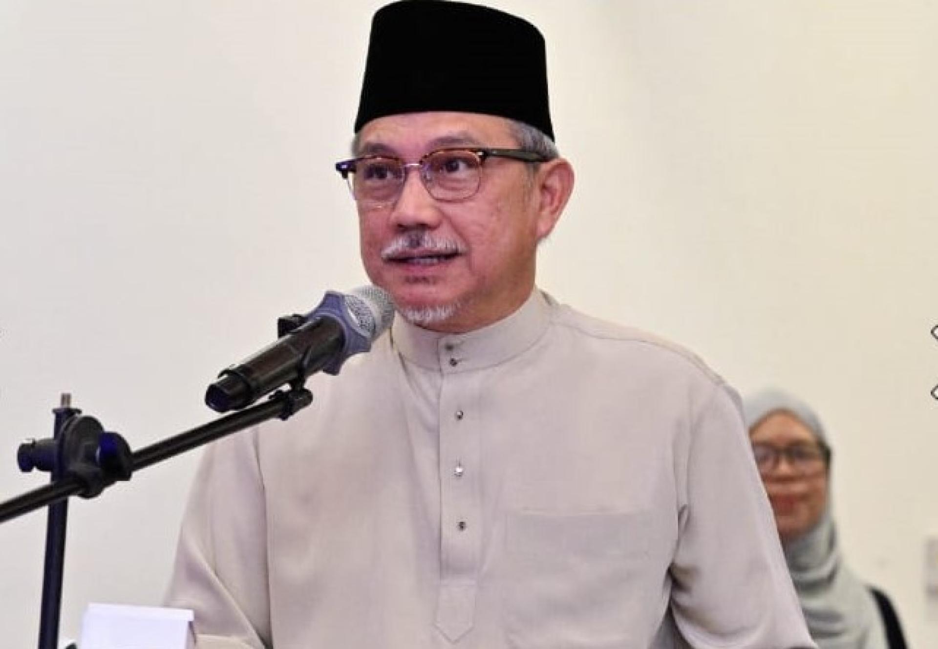 发展部长拿督朱安达在会上致词