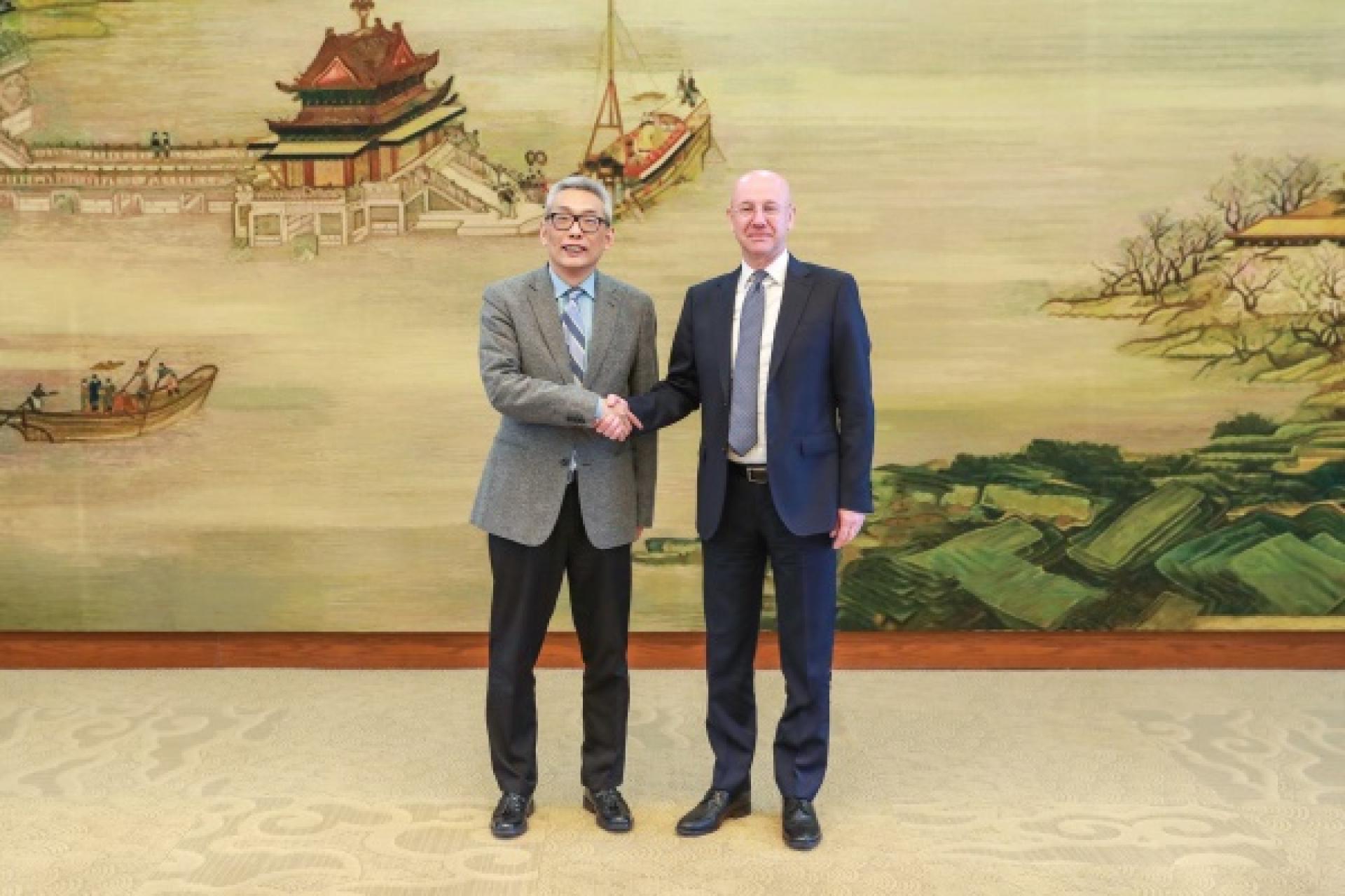 蔡伟(左）与阿利莫夫（右）举行中俄联合国和安理会事务磋商。