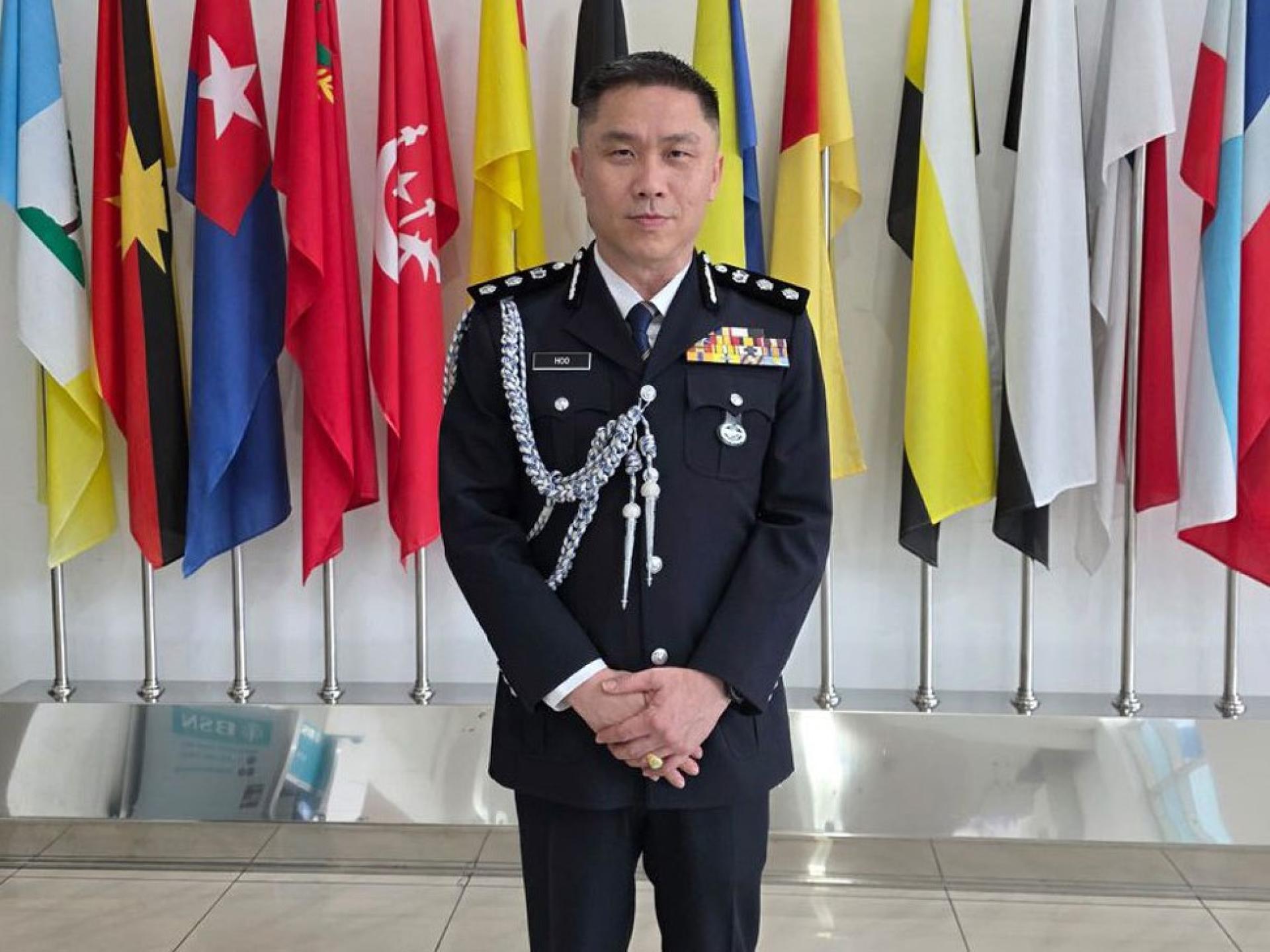 十五碑警区主任胡昌福助理总监。