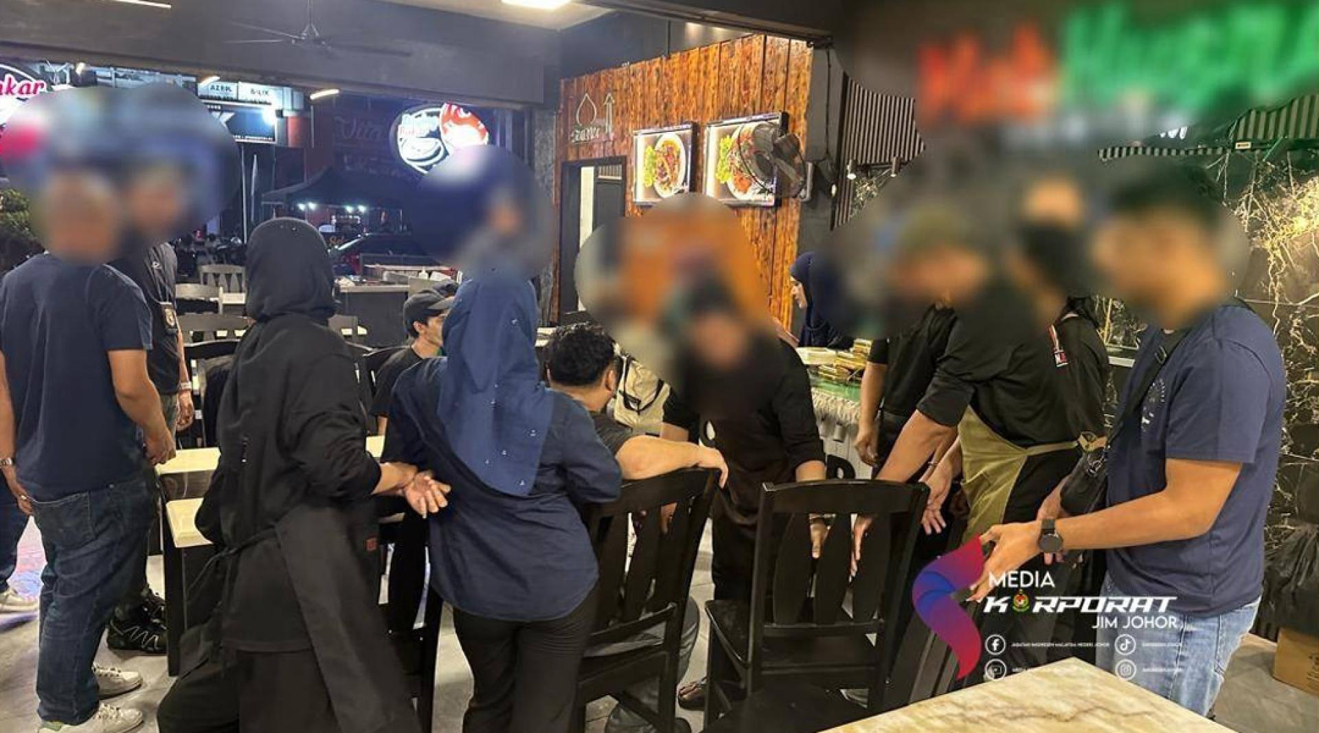 移民局在食肆展开行动，逮捕涉嫌违反各类条例的外籍人士。